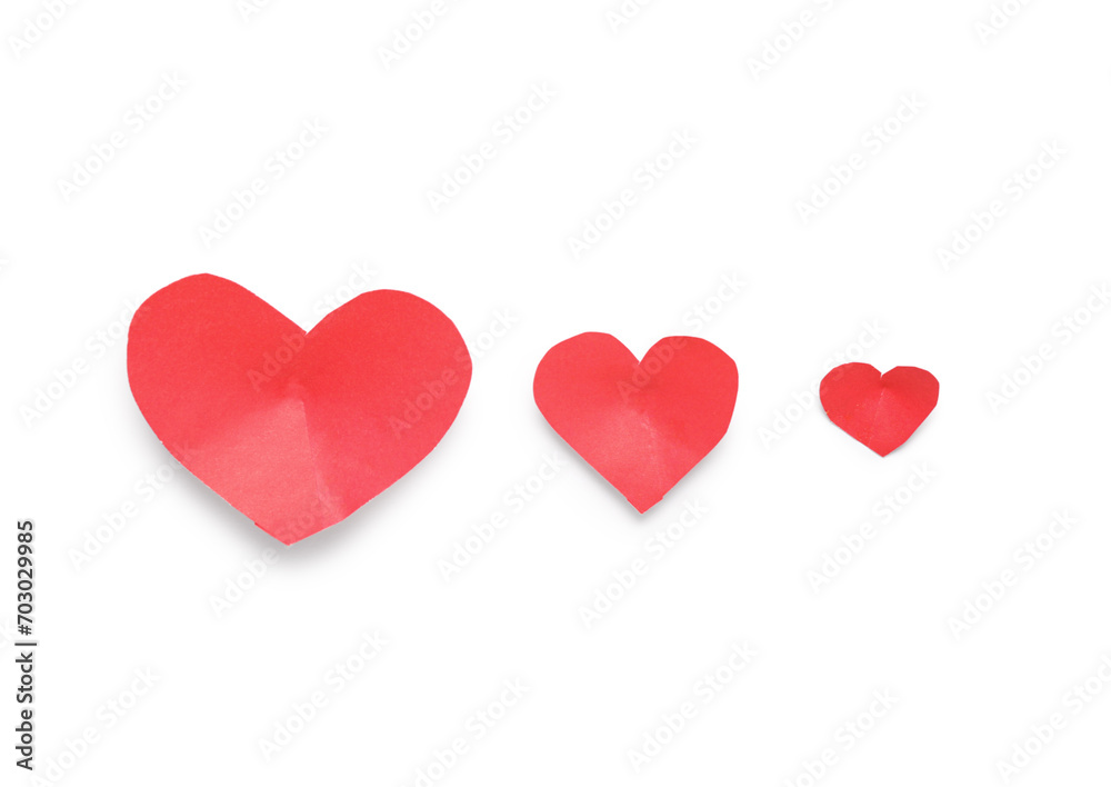 Red paper hearts on light background. Valentines Day celebration
