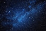 Fototapeta Kosmos - Twinkling starfield texture in a clear night sky.