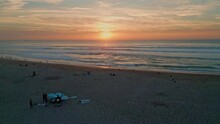 Orange Ocean Sunset Shining On Endless Marine Horizon Summer Evening Drone View.
