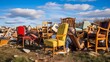 A landfill site with piles of discarded furniture
