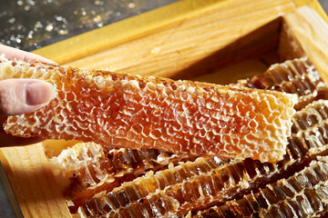 Wall Mural - Honey in honeycomb, organic food ingredients