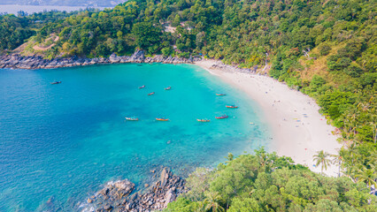 Wall Mural - Paradise beach Phuket Patong. aerial top view amazing freedom beach small white sand beach with perfect nature. white wave hit the rock around island. green forest peaceful. green sea, landscape.