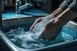 Soapy hands washing in a sink with a blue hue