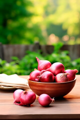 Wall Mural - Red onion in a bowl in the garden. Selective focus.