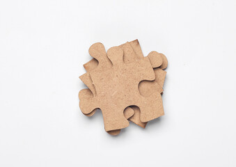 Wall Mural - Wooden pieces jigsaw puzzle on white background