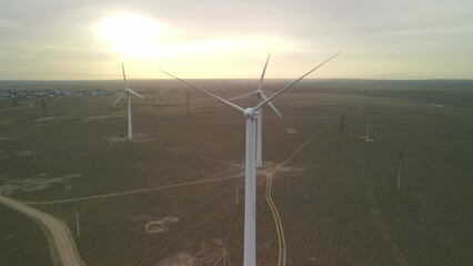 Wall Mural - Wind generators, alternative energy sources. Green energy using the power of nature. Drone view of a wind farm.