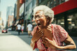 Elderly woman has a heart attack on the street on a summer day