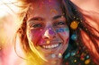 Portrait of a young woman on a holy festival with colors  in her face 