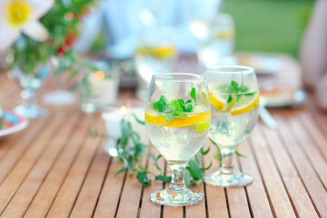 Two glasses of homemade lemonade on table