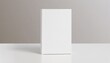 white book mockup front view with blank hard cover standing on white table 3d rendering