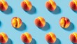 peaches pattern top view of fresh fruits on a blue background repetition concept
