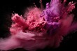 Explosion of mauve colored powder on black background
