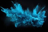 Fototapeta  - Explosion of aqua blue colored powder on black background