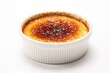 Creme brulee traditional French vanilla cream dessert isolated on the white background