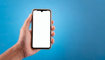 Hand using smartphone with blank screen, isolated on blue background