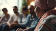 © Kateryna - A group of cancer patients in a therapy session, sharing stories and hope, cancer, blurred background, with copy space