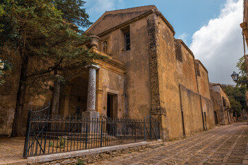 Wall Mural - View of church and medieval bell tower