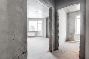  interior of the apartment without decoration in gray colors. rough finish