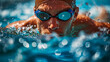 Portrait of a swimmer in goggles and cap swimming in the pool. 