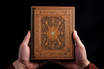 Qur'an in hand holy book of muslims public item