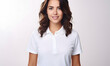 Happy woman in white polo shirt on a white background