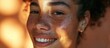 © 2rogan - Happy woman using beauty products for healthy skincare and aesthetic shine. Young model with face freckles using cosmetic products and sunscreen for wellness and melasma.