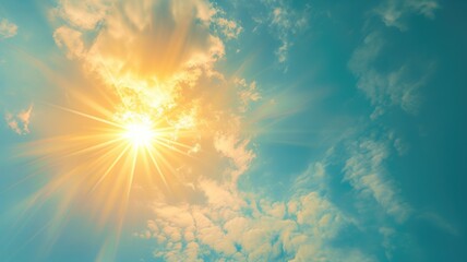 Wall Mural - sunlight bursting through clouds in a blue sky