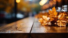 Autumn Leaves On Wooden Table
