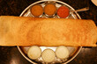 Idly Dosa ghee roast with coconut chutney sambar popular South Indian Breakfast, Kerala, Tamil Nadu India. Top view of Masala dosa, a type of pancake stuffed with potato and tomato curry side dish.