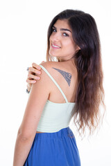 Wall Mural - tattooed pretty woman brunette long brown hair smiling behind on white background