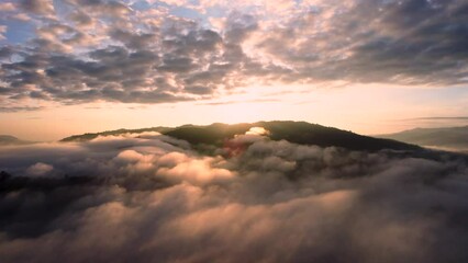 Wall Mural - Aerial shot of majestic sunrise in the mountains