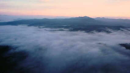 Wall Mural - Aerial shot of majestic sunrise in the mountains