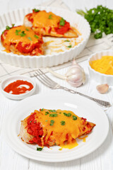 Wall Mural - baked juicy chicken breasts with tomatoes, cheese