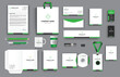 © ruby - office business stationary set in green black white color vector design with letter head envelop folder id card notepad dvd cover usb paper clip pen pencil cups business card shopper
