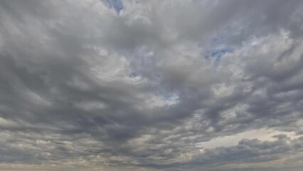 timelapse of overcast - dramatical bg with clouds