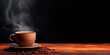 Cup of hot coffee on dark wooden table over black background