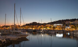 Fototapeta  - Port of Le Lavandou in the evening, France. Luxury yachts and motor boats.	
