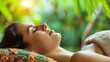 smiling woman lying on her back on white towel, relaxing and resting in an exotic place, her eyes closed