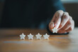 © NOTE OMG - Customer Experience Concept. Man hand showing on five star excellent rating on background, copy space