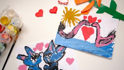 Wall Mural - Child drawing hearts, pets, cats family, funny sketch for birthday, Mothers day or Valentines day. Education. Inspiration and imagination