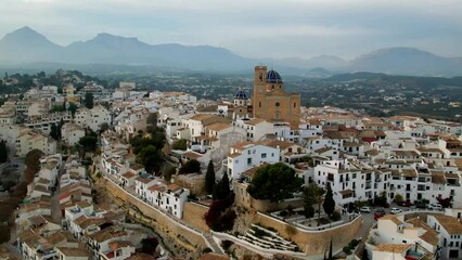 Wall Mural - coastal town Altea in popular coast of Spain in Costa Blanca. aerial drone high angle view with scenic cathedral, Valencia province