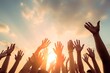 © duyina1990 - People of different ethnicities raising their hands in the air