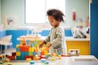 © studioworkstock - child playing with colorful blocks in hospital room