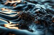 Abstract image of smooth black fluid in the air