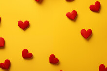 Red hearts on yellow background