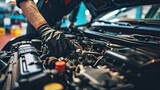 Fototapeta  - Auto mechanic checking for engine problems