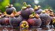 Close-up of many wet mangosteens. Selective focus