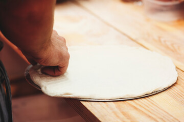 Poster - Cooking pizza in a pizzeria or restaurant