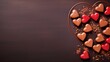  a couple of heart shaped chocolates sitting on top of a wooden table with sprinkles of chocolate on top of them and a heart shaped cookie on a plate.
