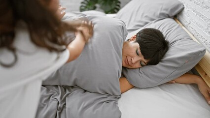 Sticker - Loving mother and daughter together in their cozy bed, waking up the exhausted mom in the heart of their comfy bedroom room, a relaxing morning that reiterates the comfort of being home.